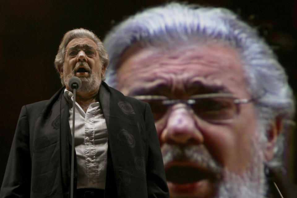 FILE - In this Saturday, Dec. 19, 2009 file photo, Placido Domingo performs during a sound check prior to a free concert in Mexico City. Two investigations into Domingo's behavior were opened in 2019 after Associated Press stories in which more than 20 women said the legendary tenor had pressured them into sexual relationships, behaved inappropriately and sometimes professionally punished those who rebuffed him. Dozens of others told the AP that they had witnessed his behavior. (AP Photo/Marco Ugarte)