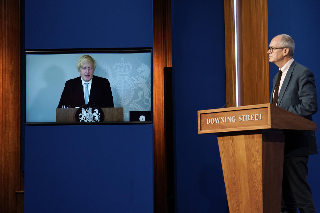 LONDON, ENGLAND - JULY 19: Chief Scientific Advisor Patrick Vallance attends a media briefing on coronavirus at Downing Street with Britain's Prime Minister Boris Johnson attending online via a screen from Chequers, the country house of the Prime Minister where he is self-isolating on July 19, 2021 in London, England. The Prime Minister and Chancellor were both contacted by Track and Trace this weekend after the Health Minister, Sajod Javid, tested positive for the Covid-19 virus. Today sees the complete relaxation of Covid lockdown rules and is being dubbed 