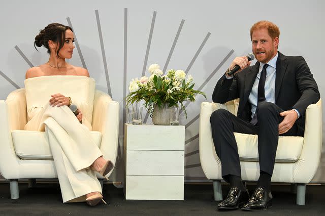 <p>Bryan Bedder/Getty</p> Meghan, Duchess of Sussex and Prince Harry, Duke of Sussex speak onstage at The Archewell Foundation Parents' Summit: Mental Wellness in the Digital Age during Project Healthy Minds' World Mental Health Day Festival 2023 on October 10, 2023 in New York City.