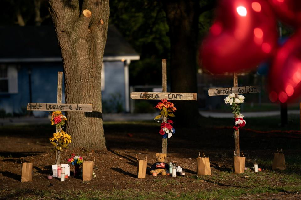 Memorials for Angela Carr, 52, Anolt Joseph "A.J." Laguerre Jr., 19, and Jerrald Gallion, 29, near a Dollar General store where they were fatally shot on Aug. 26, 2023, in Jacksonville, Fla.