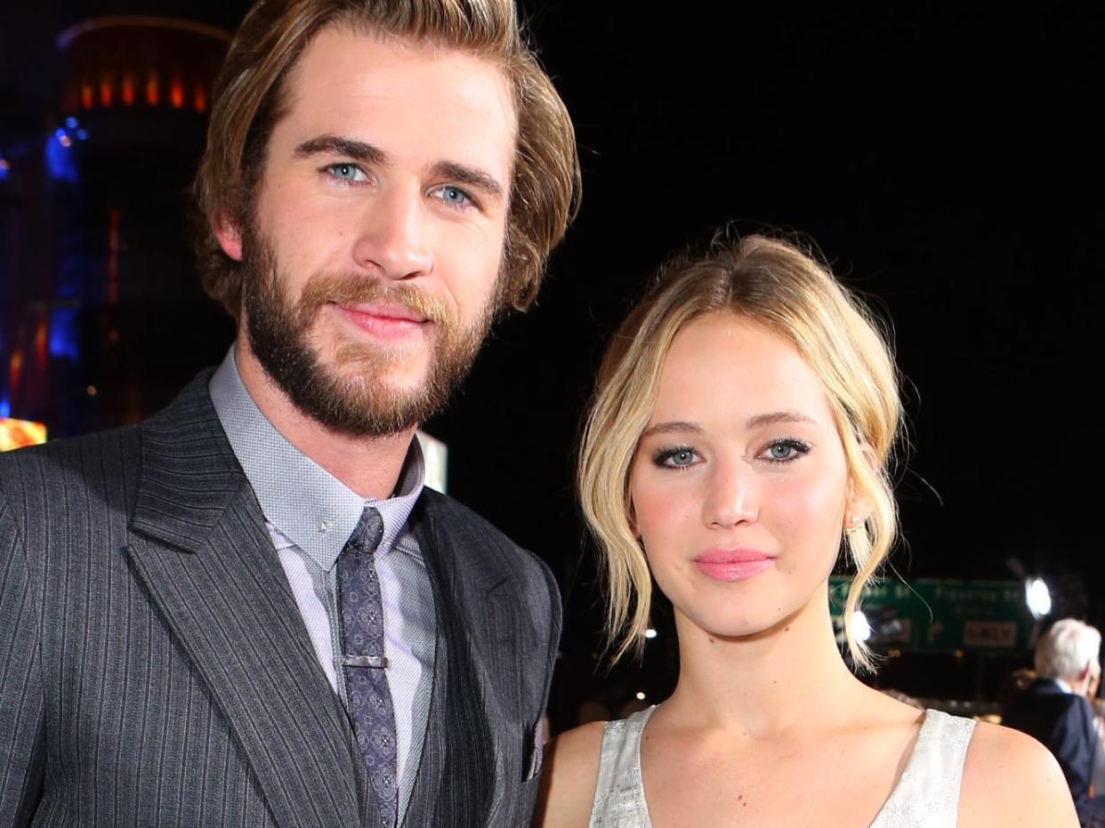 Liam Hemsworth and Jennifer Lawrence at the LA premiere of "The Hunger Games: Mockingjay — Part 1" in 2014.