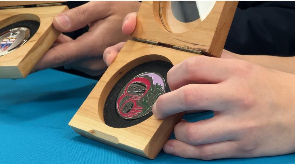 The medal that will be awarded to 250 Yukoners for their leadership and reconciliaton work includes a formline design by Tagish First Nation artist Violet Gatensby. Gatensby depicted a balsam branch beside a figure - the figure represents how youth are picking up the practices of their elders.