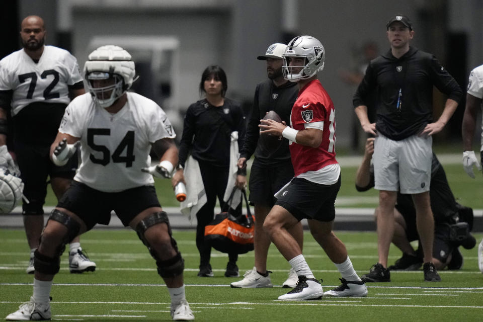 Las Vegas Raiders' Jimmy Garoppolo takes part during a practice at NFL football training camp Friday, Aug. 4, 2023, in Henderson, Nev. (AP Photo/John Locher)
