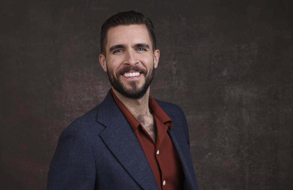 FILE - Josh Segarra, a cast member in the Apple TV+ television series "The Big Door Prize," poses for a portrait during the Winter Television Critics Association Press Tour on Wednesday, Jan. 18, 2023, at The Langham Huntington Hotel in Pasadena, Calif. (Willy Sanjuan/Invision/AP, File)