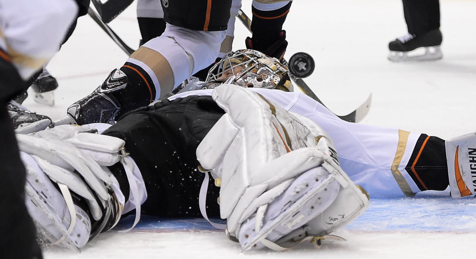 Anaheim Ducks goalie John Gibson stops a shot on goal during the second period in Game 4 of an NHL hockey second-round Stanley Cup playoff series against the Los Angeles Kings, Saturday, May 10, 2014, in Los Angeles. (AP Photo/Mark J. Terrill)
