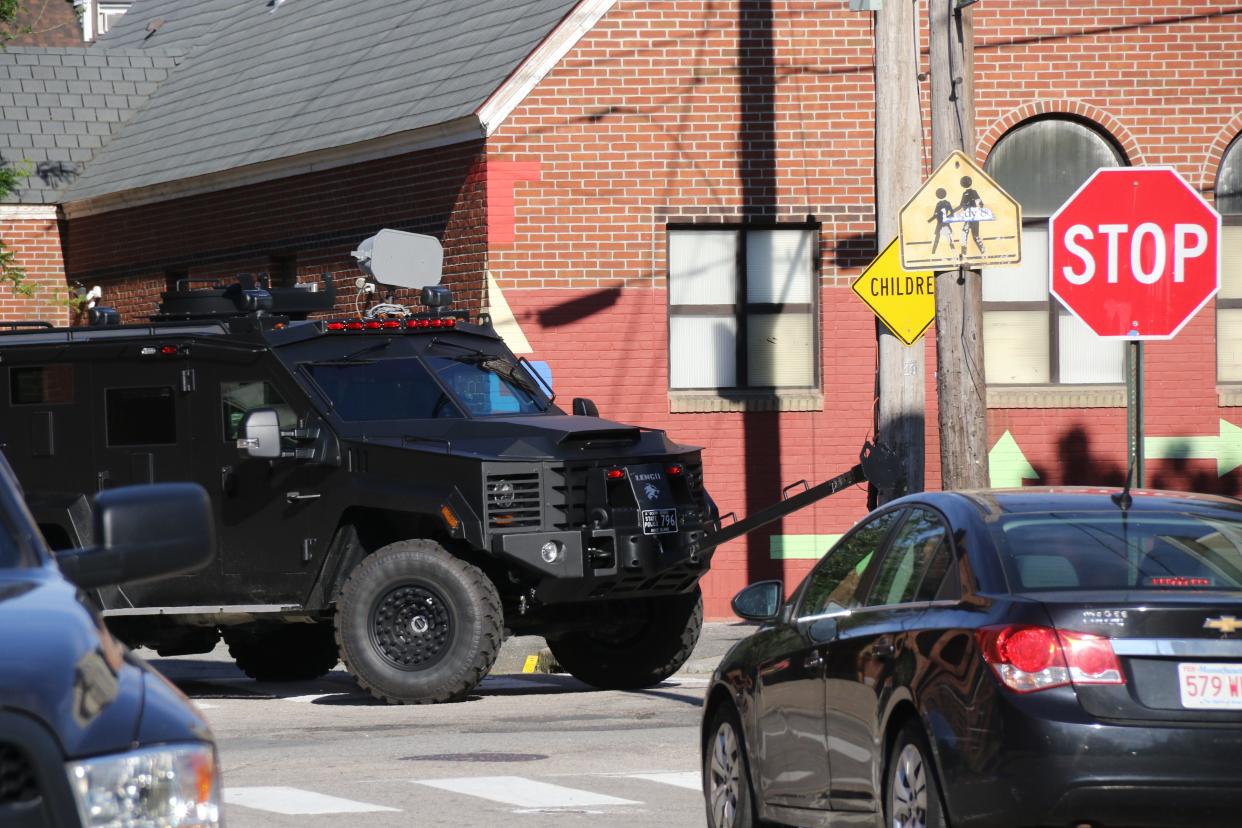 The Rhode Island State Police use an armored truck with a battering ram to enter the clubhouse of the Rhode Island chapter of the Hells Angels on Messer Street in Providence in 2019. The chapter’s president was arrested on a felony assault charge.