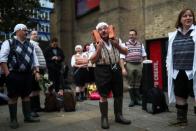 Monty Python fans dressed as the Gumbys gather in an attempt to set the world record for the largest gathering of people dressed as Gumbys as a part of the 50th anniversary of Monty Python's Flying Circus at the Roundhouse in London