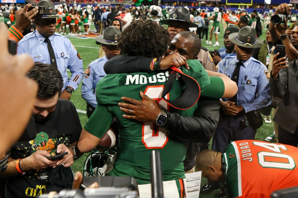 Dec 16, 2023; Atlanta, GA, USA; Florida A&M Rattlers quarterback Jeremy Moussa (8) and head coach Willie Simmons celebrate after a victory against the Howard Bison in the Celebration Bowl at Mercedes-Benz Stadium. Mandatory Credit: Brett Davis-USA TODAY Sports