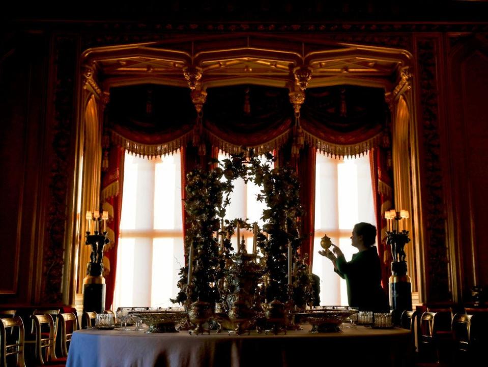 Putting the finishing touches to the Grand Service in the State Dining Room.