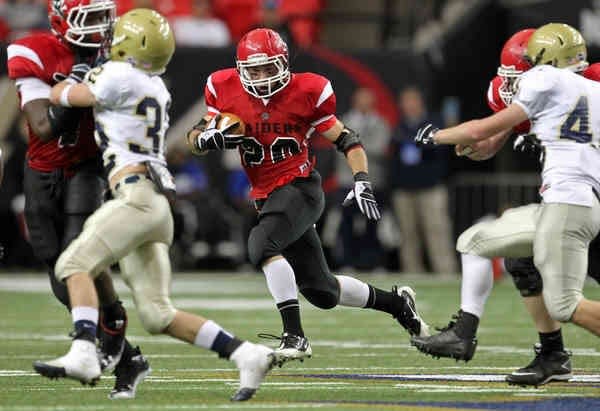 Savannah Christian running back Will Austin (20) looks for running room in the first half of their game against Landmark Christian in the Class A Georgia State High School Football Championship at the Georgia Dome Saturday afternoon in Atlanta, Ga., December 10, 2011.