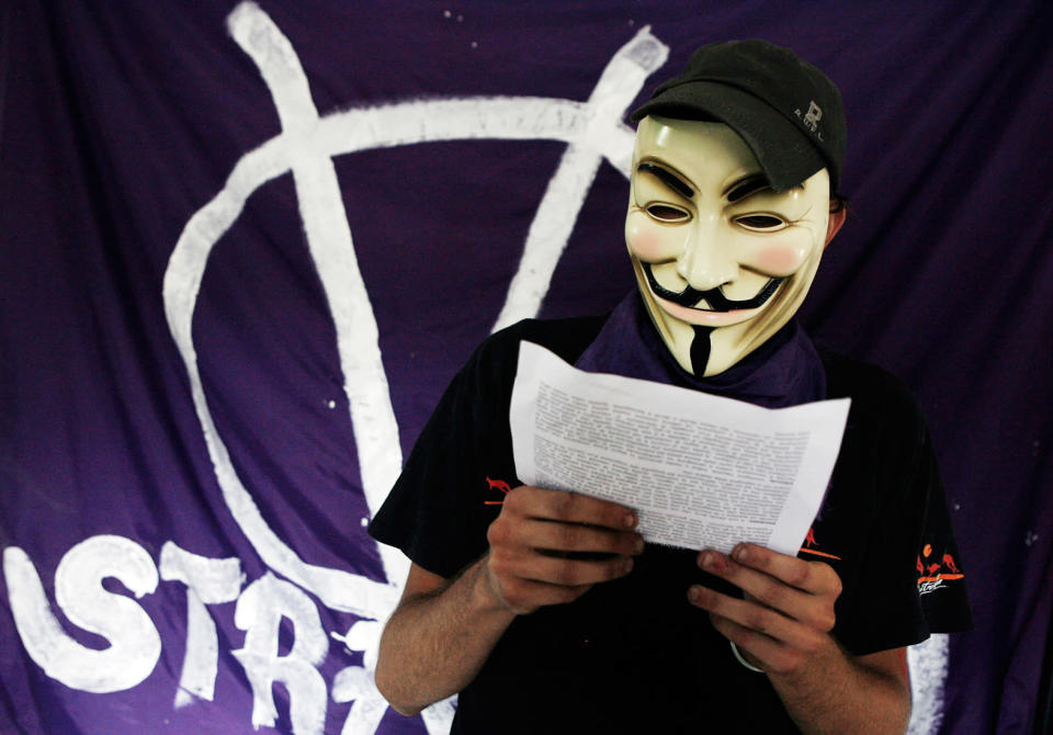 Students wearing 'V'' masks in L’Aquila, Italy took over a building during G8 protests in July 2009.