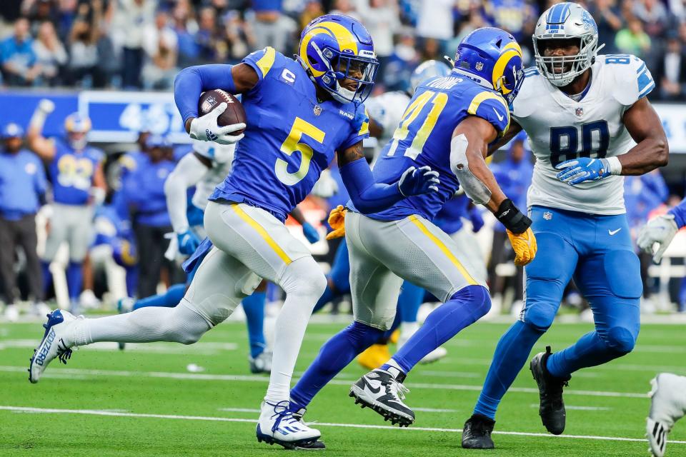 Rams cornerback Jalen Ramsey (5) returns an interception against the Lions on Oct. 24.