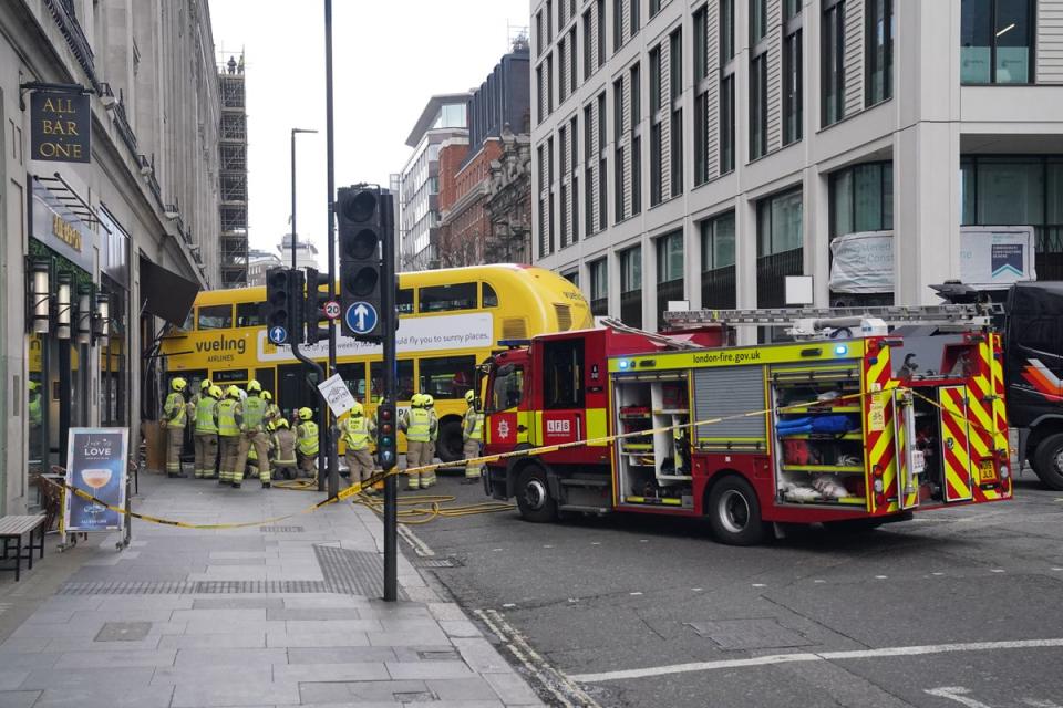 Emergency workers at the scene of a bus crash in New Oxford Street (Jonathan Brady/PA Wire)