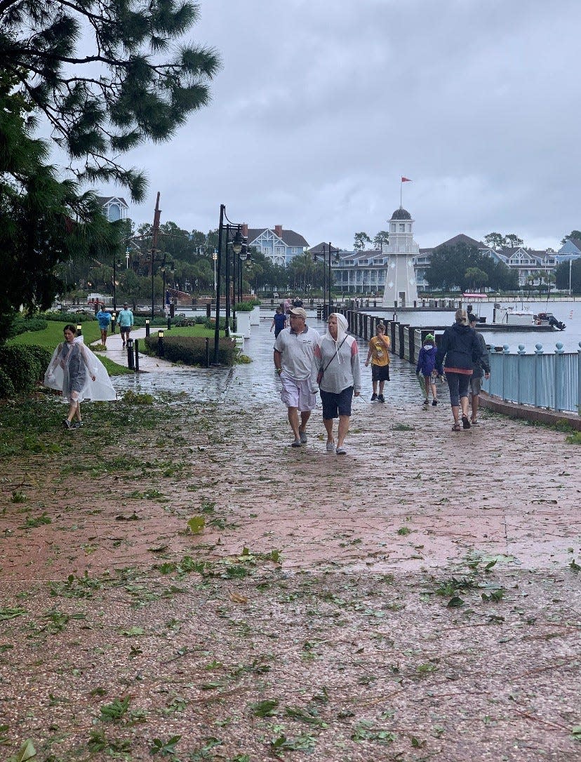 The walkway at the Yacht Club at Walt Disney World Resort was strewn with debris Thursday morning.