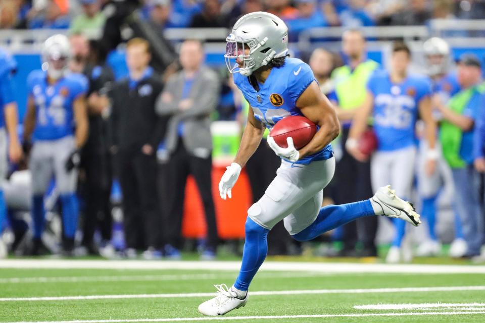 Detroit Lions kick returner Khalil Dorsey runs on a kickoff return against the Green Bay Packers during the first half at Ford Field in Detroit on Thursday, Nov. 23, 2023.