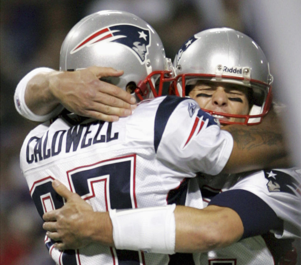 New England Patriots quarterback Tom Brady, right, once had Reche Caldwell as his go-to receiver in 2006. (REUTERS/Eric Miller)