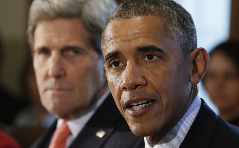 U.S. President Barack Obama meets members of his Cabinet at the White House in Washington February 3, 2015. Beside Obama is Secretary of State John Kerry. REUTERS/Kevin Lamarque