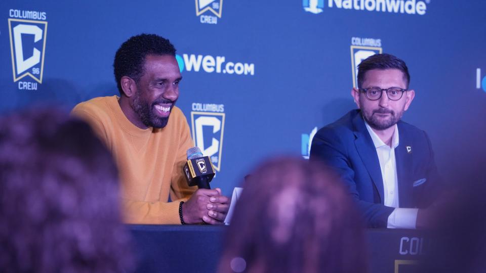 Wilfried Nancy  talks with the media as he is introduced as new coach of the Columbus Crew at Huntington Field Club at Lower.com Field December 6, 2022. At right is President and General Manager Tim Bezbatchenko.