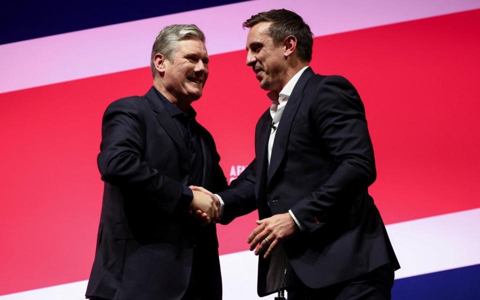 Sir Keir Starmer and Gary Neville will hope to prove Labour is on the ball - Henry Nicholls/Reuters