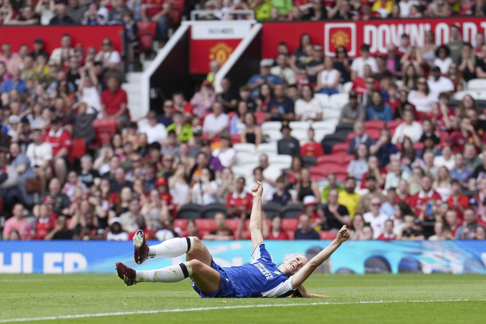 Chelsea's Melanie Leupolz celebrates after scoring their side's fifth goal of the game, during the English Women's Super League soccer match between Manchester United and Chelsea at Old Trafford, in Manchester, England, Saturday May 18, 2024. (Martin Rickett/PA via AP)