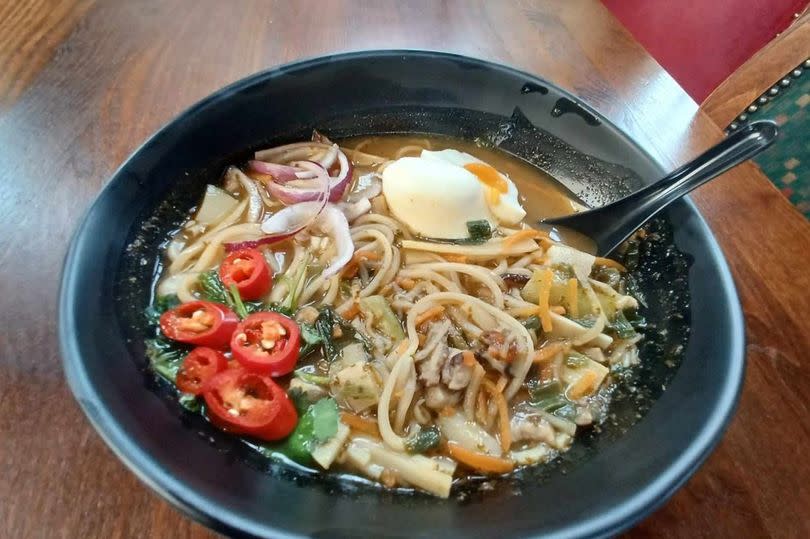 Ramen noodle bowl with poached egg
