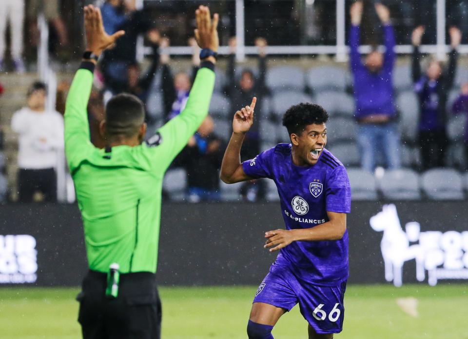 Louisville City FC's Joshua Wynder (66) celebrated after he scored the game winning goal during a shootout against St. Louis City SC in the U.S. Open Cup at the Lynn Family Stadium in Louisville, Ky. on April 20, 2022.   Louisville won 0-0 (9-8).