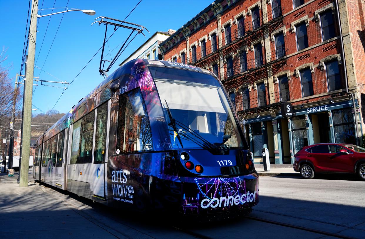 The Cincinnati Connector makes its way down Race Street at Findlay Market in Over-the-Rhine last week, completing a 3.6-mile loop through OTR, Downtown and The Banks.