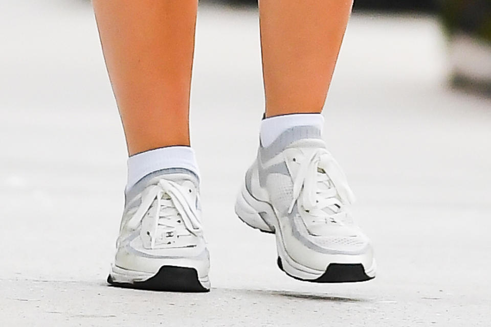 A closer view of Lily-Rose Depp sneakers. - Credit: Robert O'Neil/Splash News