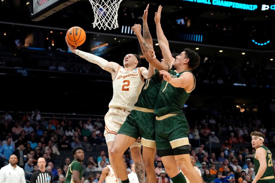 Texas guard Chendall Weaver puts up a shot contested by Colorado State's Nique Clifford in the Longhorns' win in the first-round of the NCAA Tournament last Thursday at Spectrum Center in Charlotte, N.C. Weaver will return next season as a key player in a revamped rotation.