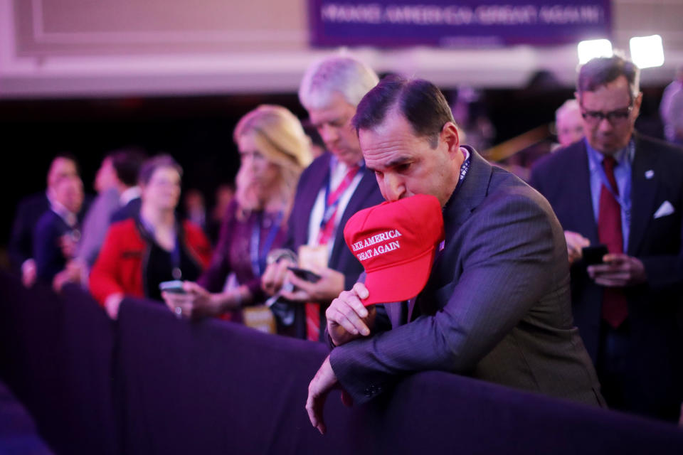 A supporter of Republican presidential nominee Donald Trump watches early results during the election night event at the New York Hilton Midtown in New York, on Nov. 8.