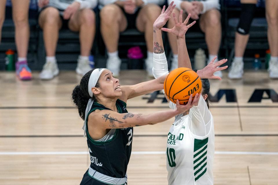 UWGB's Jasmine Kondrakiewicz, left, and the Phoenix will play Tennessee in the first round of the NCAA Tournament on Saturday.