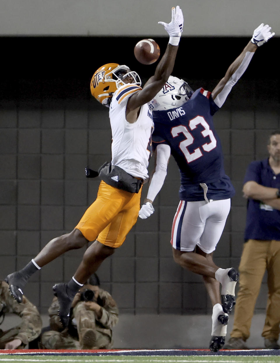 Arizona cornerback Tacario Davis (23) defends against UTEP wide receiver Kelly Akharaiyi (4) during the first half of an NCAA college football game on Saturday, Sept. 16, 2023, in Tucson, Ariz. (Kelly Presnell/Arizona Daily Star via AP)