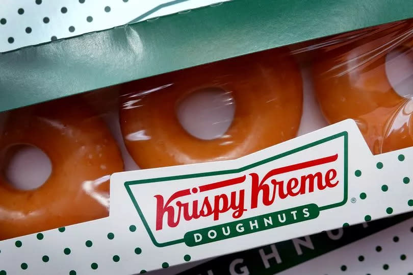 An image of Krispy Kreme original glazed doughnuts in a box