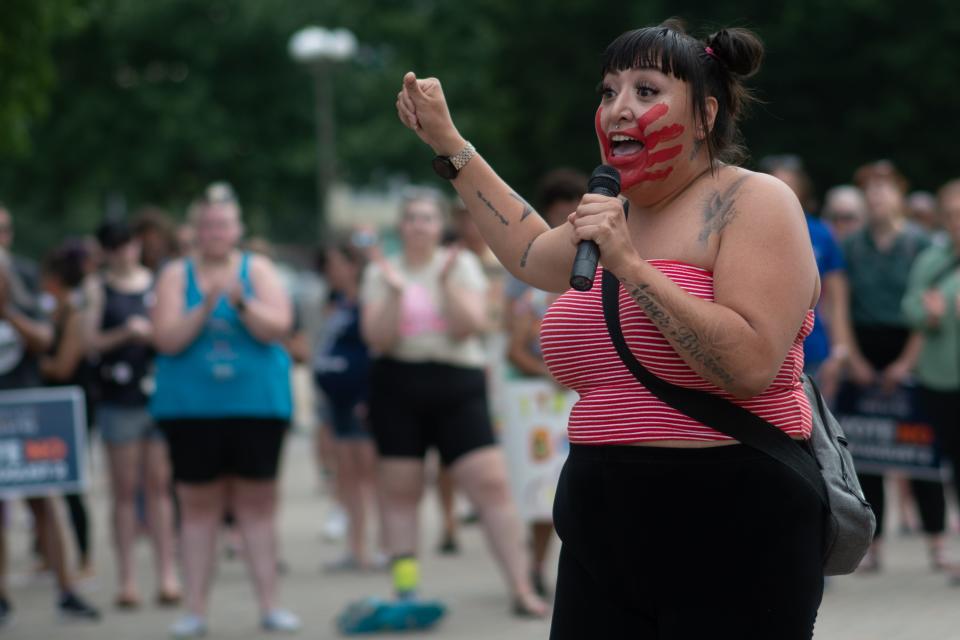 Topekan Jolie Lippitt shares her story about surviving abuses in her life during an abortion-rights rally Friday at the Kansas Statehouse.