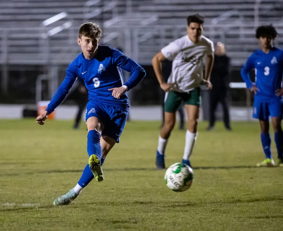 Marlin senior Braden Masker scores on a penalty kick. Arnold High School hosted Mosley in boys soccer Thursday, January 13, 2022.