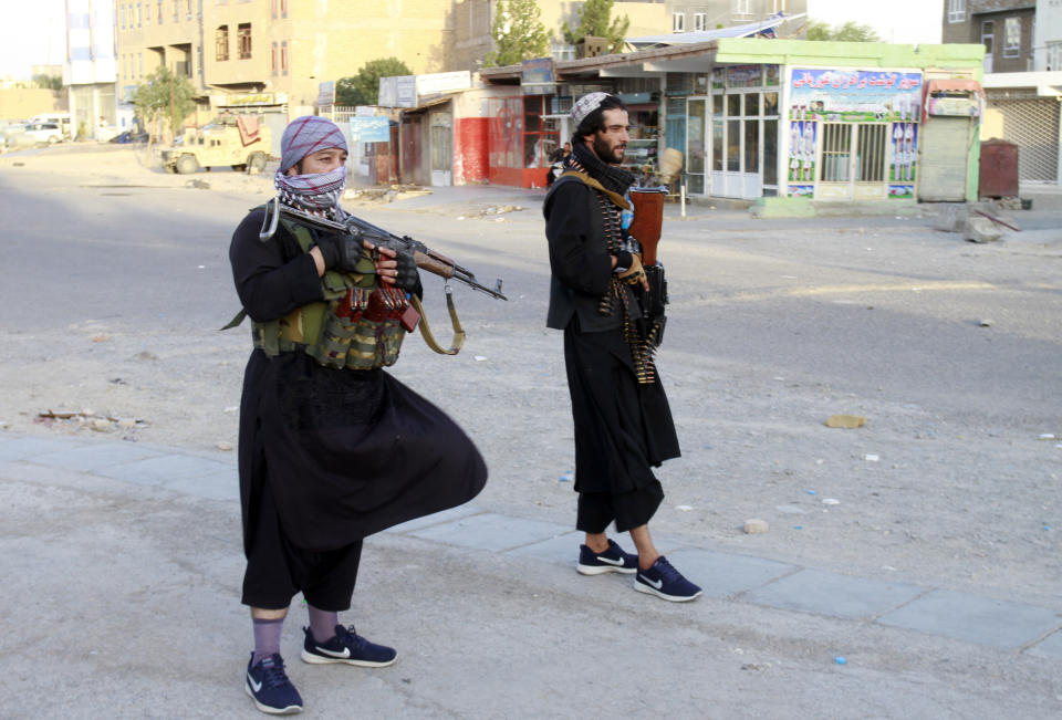 Private militia loyal to Ismail Khan, the former Mujahideen commander, patrols after security forces took back control of parts of Herat city following fighting between Taliban and Afghan security forces in Herat province, west of Kabul, Afghanistan, Friday, Aug. 6, 2021. (AP Photo/Hamed Sarfarazi)