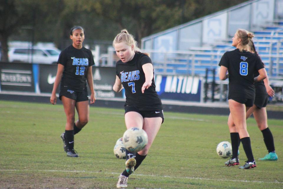 Bartram Trail midfielder Carolyn Johnson (7) takes a shot in warm-ups.