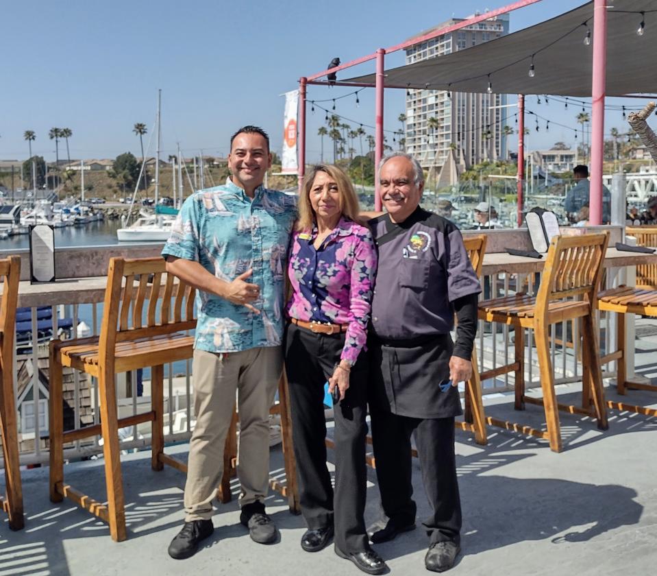 From left to right, Luis Lopez, Jr., Linda Lopez and award-winning Executive Chef Luis Lopez Sr. of the Lighthouse Oyster Bar & Grill.
