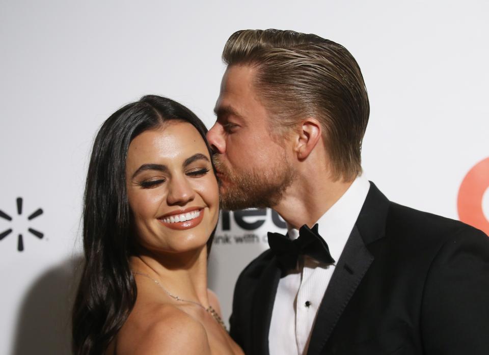 Derek Hough, pictured with wife Hayley Erbert in 2020, is returning to his tour after wife and dance partner Hayley Erbert's recent health struggles.