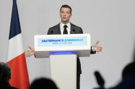 Far-right National Rally party president Jordan Bardella gives a press conference, Monday, June 24, 2024 in Paris. The upcoming two-round parliamentary election will take place on June 30 and July 7. (AP Photo/Christophe Ena)