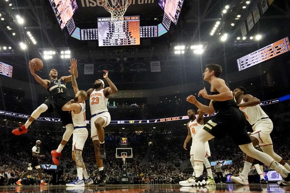 Milwaukee Bucks' Giannis Antetokounmpo shoots during the first half of an NBA basketball game against the New York Knicks Friday, Jan. 28, 2022, in Milwaukee. (AP Photo/Morry Gash)