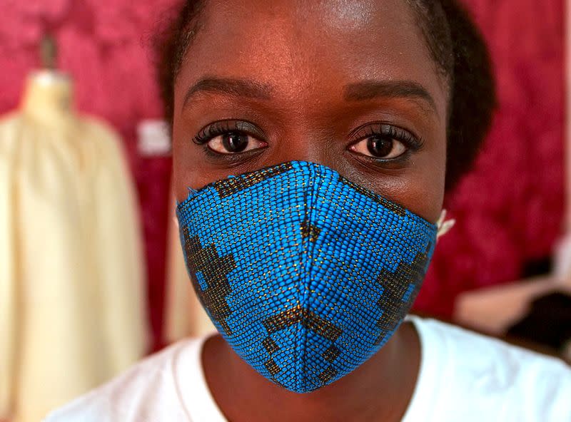 Fashion designer Sophie Zinga poses at her workshop in Dakar