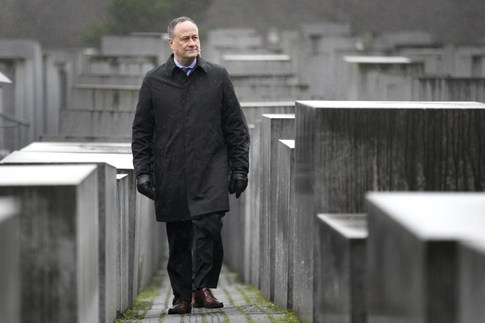 The Second Gentleman of the United States, Douglas Emhoff, walks between concrete steles during his visit at the 'Memorial to the Murdered Jews of Europe' in Berlin, Germany, Tuesday, Jan. 31, 2023. (AP Photo/Michael Sohn, pool)