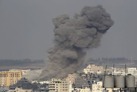 Smoke rises following what witnesses said was an Israeli air strike in Gaza August 22, 2014 REUTERS/Ahmed Zakot