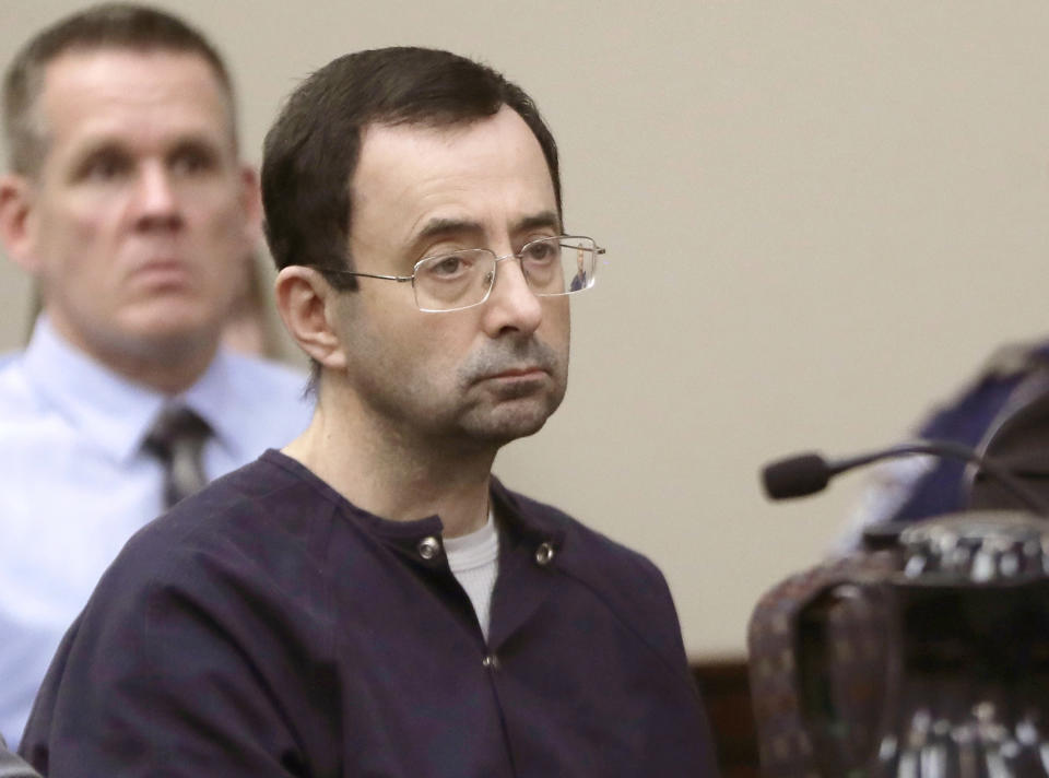 FILE - In this Jan. 24, 2018, file photo, Larry Nassar, a former doctor for USA Gymnastics and member of Michigan State's sports medicine staff, sits in court during his sentencing hearing in Lansing, Mich. The FBI made numerous serious errors in investigating allegations against former USA Gymnastics national team doctor Larry Nassar and didn't treat the case with the “utmost seriousness,” the Justice Department's inspector general said Wednesday, July 24, 2021. The FBI acknowledged conduct that was “inexcusable and a discredit