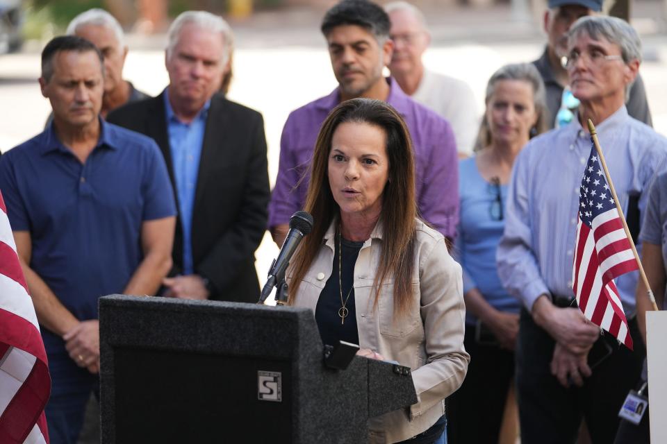 Marlene Galán-Woods, a former journalist, speaks to media during a news conference at the Arizona State University Downtown Phoenix campus on  Oct. 19, 2022.