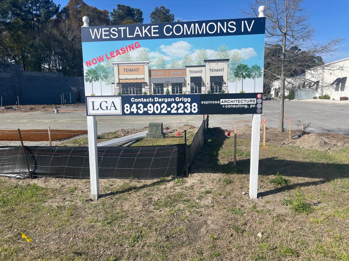 A billboard announcing what Westlake Commons IV in Carolina Forest, SC will look like upon completion. Ben Morse/The Sun News