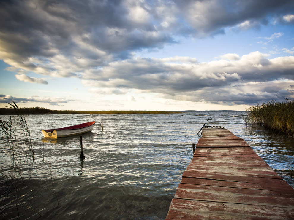 Mazury landscape with landing stage. Poland.Photograph by spreephoto.de, Getty Images TKTK