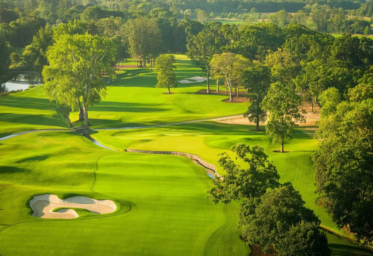 a golf course with trees