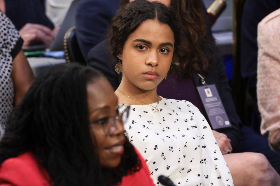 WASHINGTON, DC - MARCH 22: Leila Jackson, the daughter of U.S. Supreme Court nominee Judge Ketanji Brown Jackson, listens as her mother testifies during her confirmation hearing before the Senate Judiciary Committee in the Hart Senate Office Building on Capitol Hill March 22, 2022 in Washington, DC.